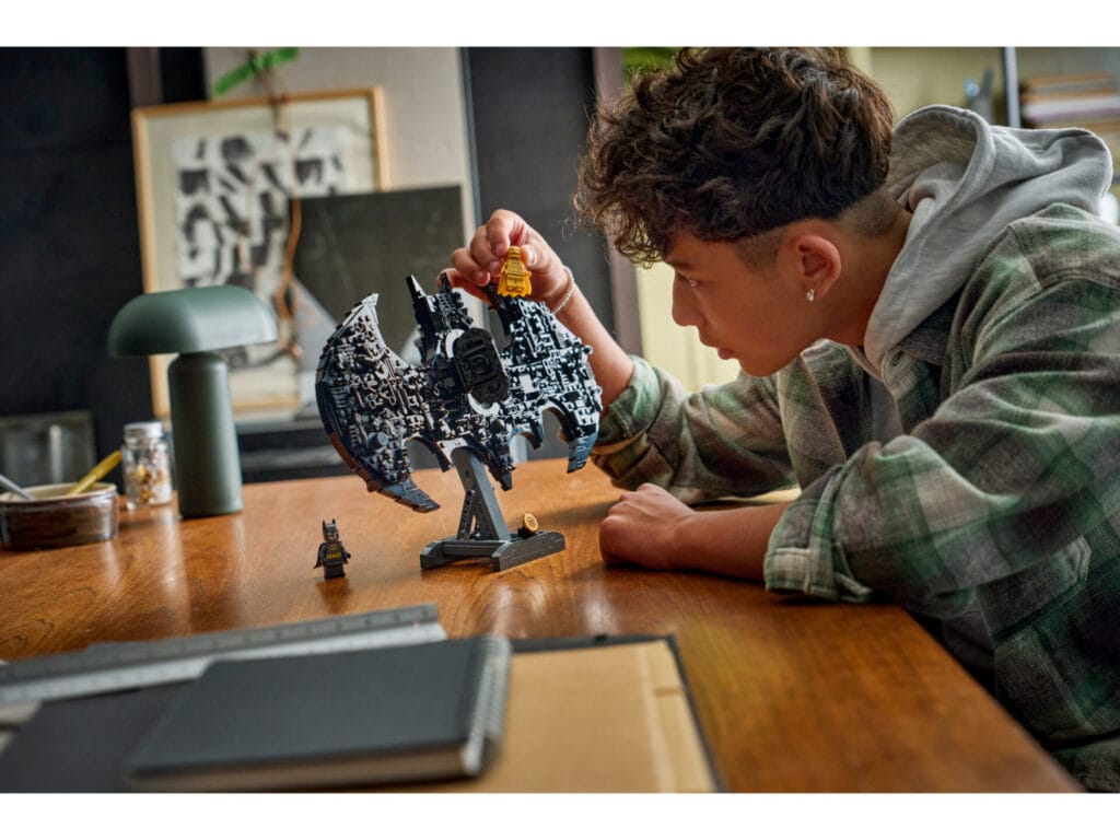 New LEGO Batman Collection Drops March 2026: Which Batmobile Will You Build First? 2 A teenage boy builds the LEGO Batman logo
