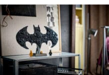 New LEGO Batman Collection Drops March 2026: Which Batmobile Will You Build First? LEGO Set 76330 Batman Logo on a table