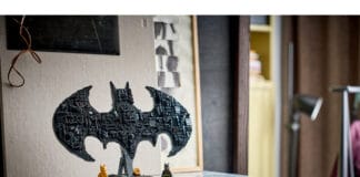New LEGO Batman Collection Drops March 2026: Which Batmobile Will You Build First? LEGO Set 76330 Batman Logo on a table