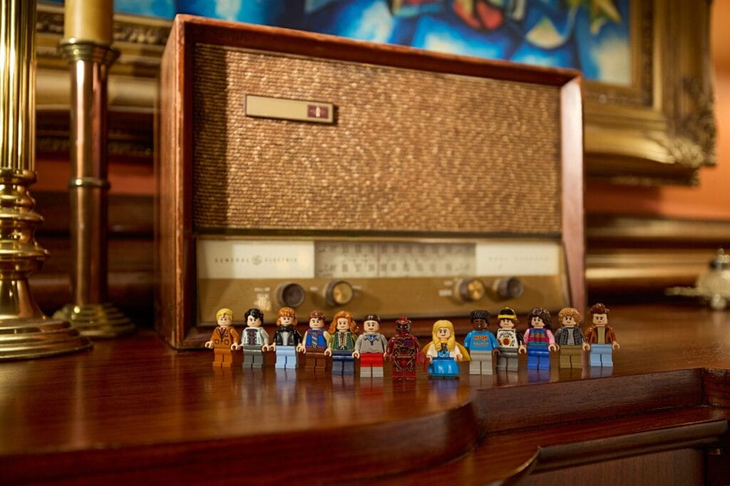 LEGO Stranger Things Creel House: The Amazing Transforming LEGO House Arrives January 2026 2 LEGO Stranger Things minifigures in front of an old radio