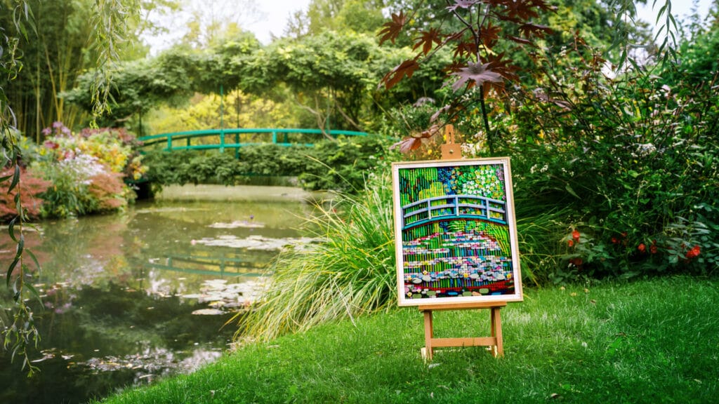 LEGO Monet Water Lilies in front of the bridge that inspired it.