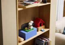 LEGO Snoopy’s Doghouse Brings Peanuts to Bricks for the First Time LEGO Snoopy's Doghouse sits on a bookshelf