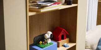 LEGO Snoopy’s Doghouse Brings Peanuts to Bricks for the First Time LEGO Snoopy's Doghouse sits on a bookshelf