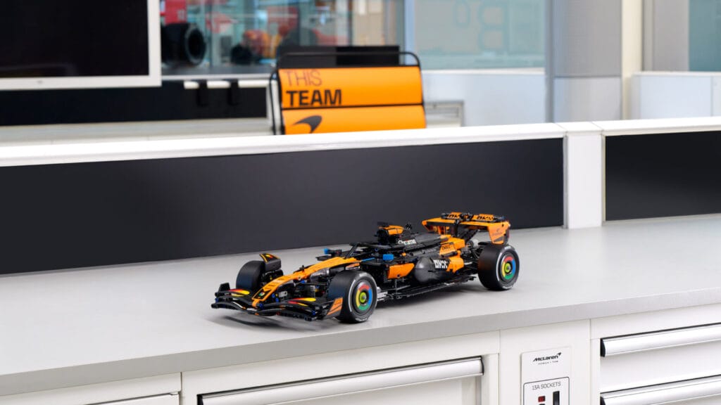 LEGO Technic McLaren F1 Car set sits on a table.
