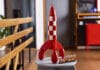 LEGO Tintin Moon Rocket Brings Hergé’s Classic Adventure to Bricks for the First Time LEGO Tintin Moon Rocket pictured on a table.