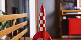 LEGO Tintin Moon Rocket Brings Hergé’s Classic Adventure to Bricks for the First Time LEGO Tintin Moon Rocket pictured on a table.